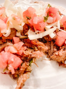 Instant Pot Carnitas with chopped tomatoes