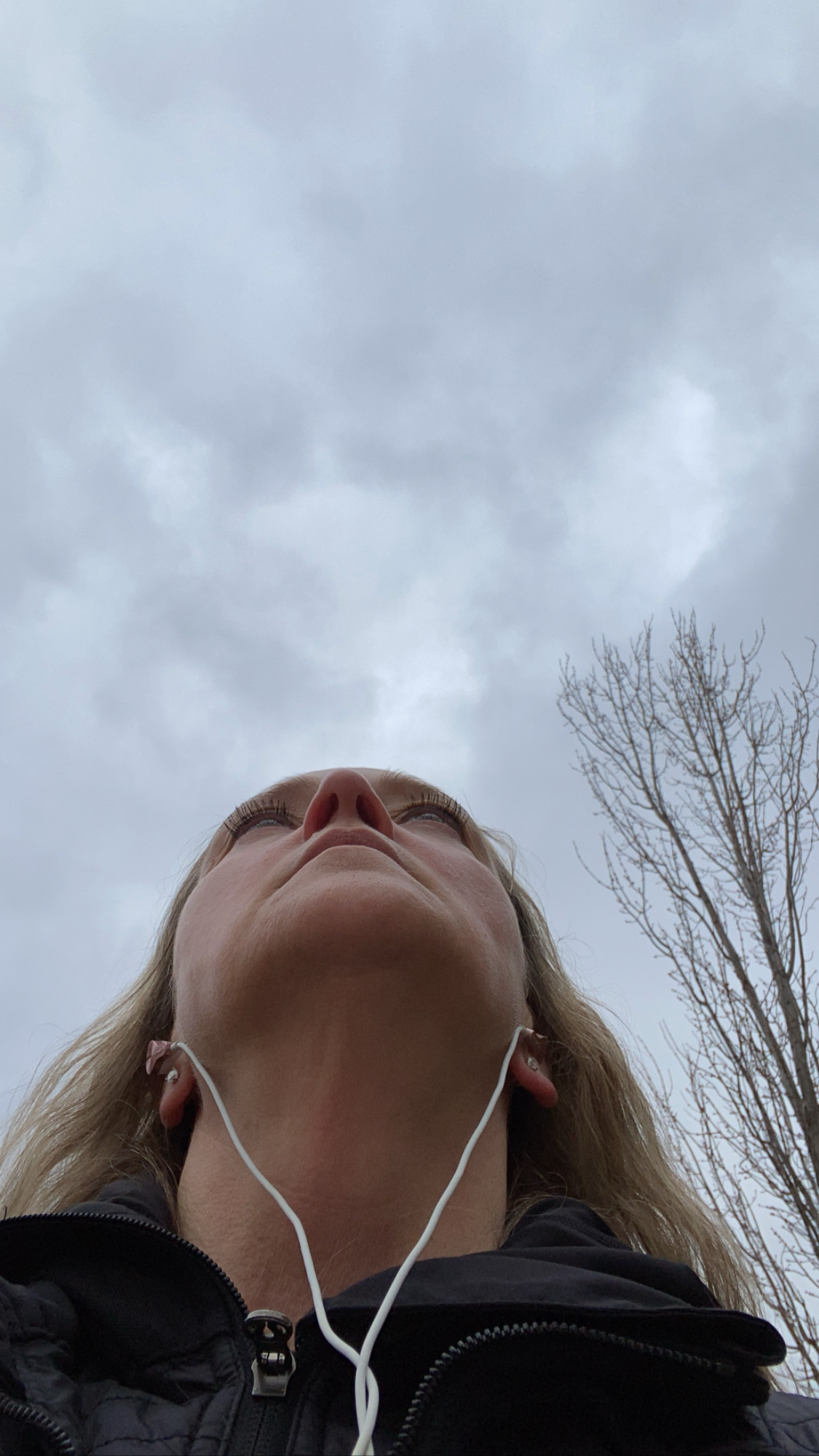 Sandy K looking up at the sky